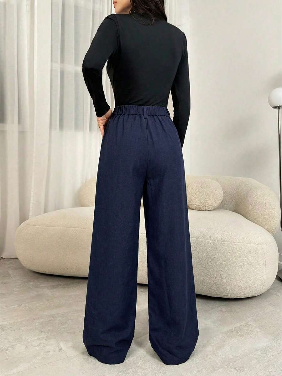 Magdalena high waist pleated wide leg trousers